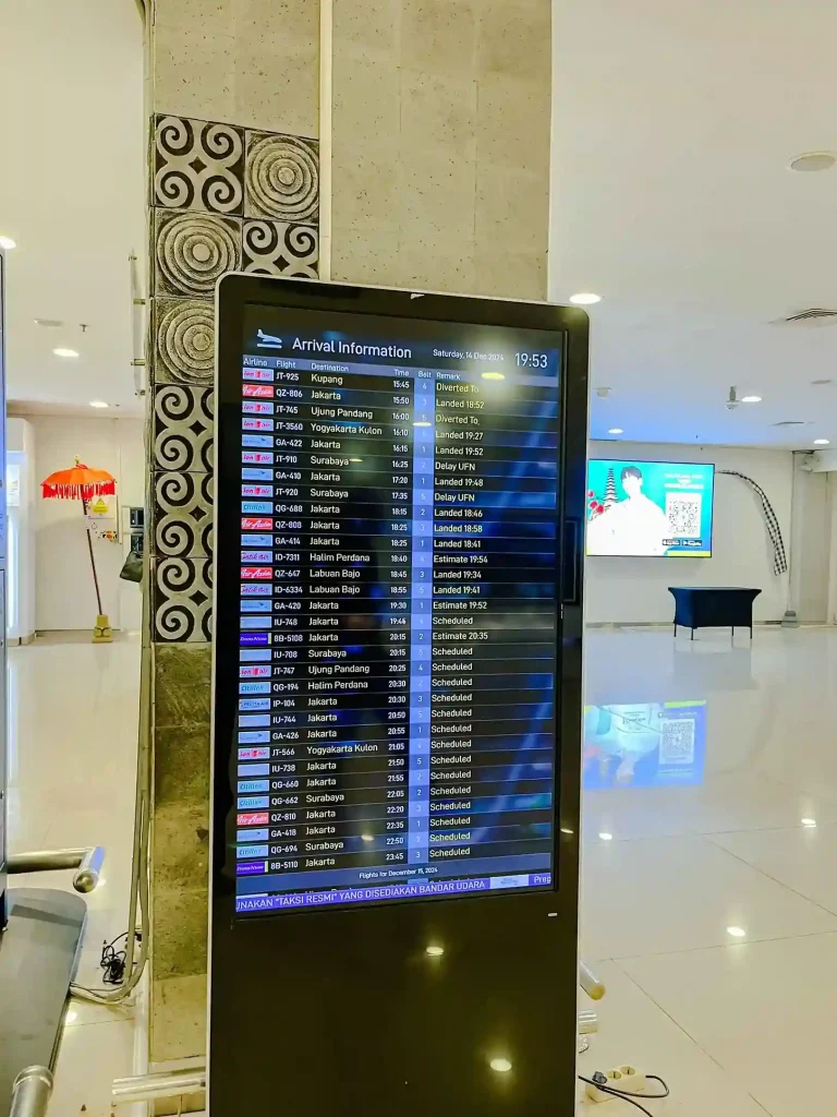 Flight information display inside Ngurah Rai International Airport, Bali